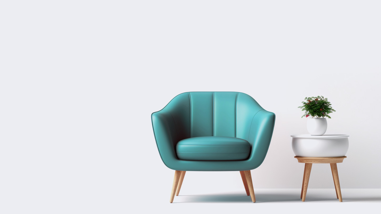 Sillon de color verde sobre fondo gris y mesita con flores para asesoramiento financiero inmobiliario